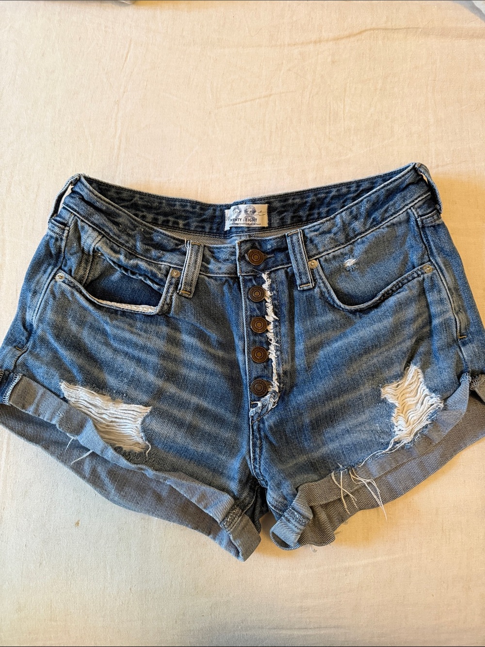 Free People | We The Free High-Rise Distressed Blue Denim Shorts - Button Front